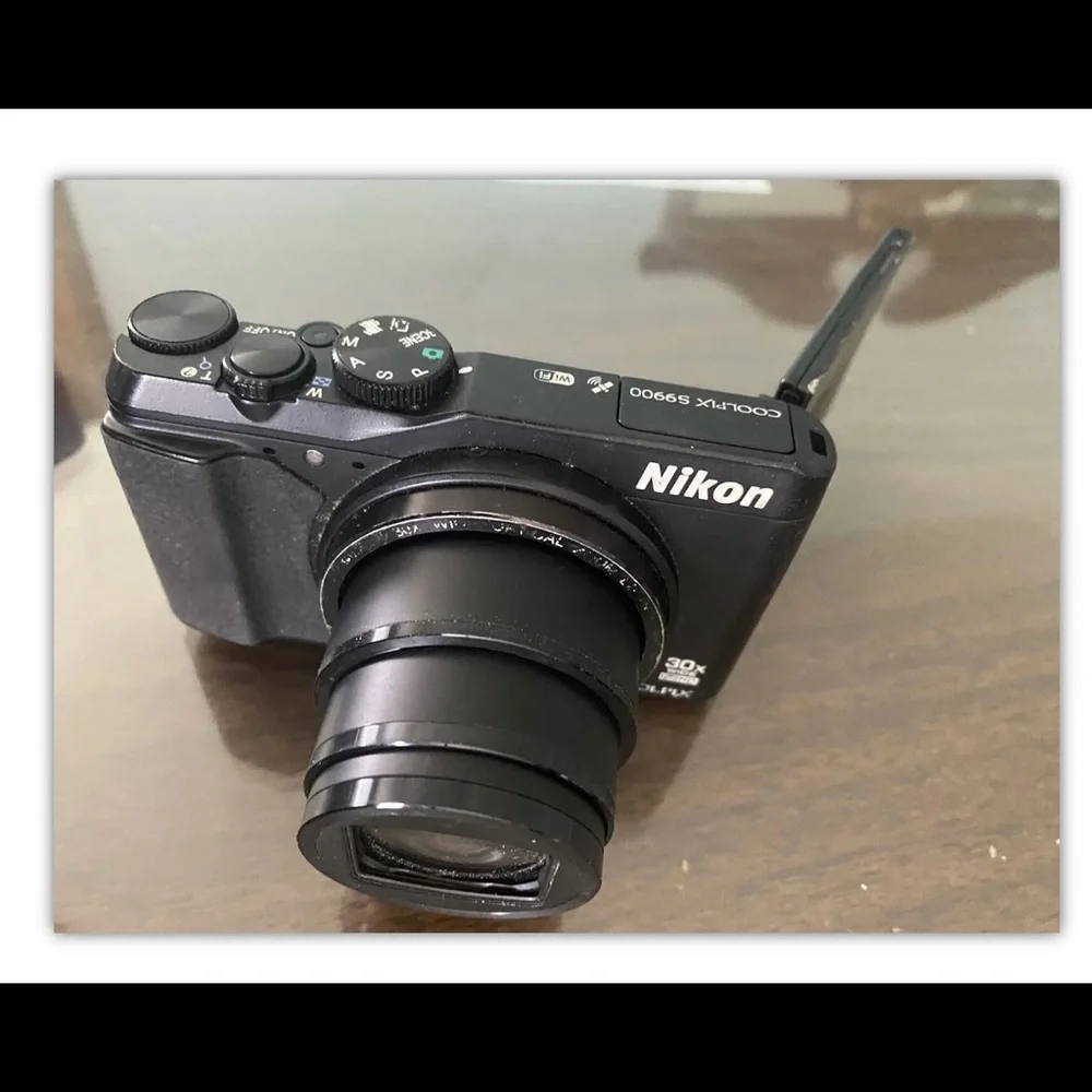 Nikon cool pix s9900 black Wi-Fi digital camera in great working condition